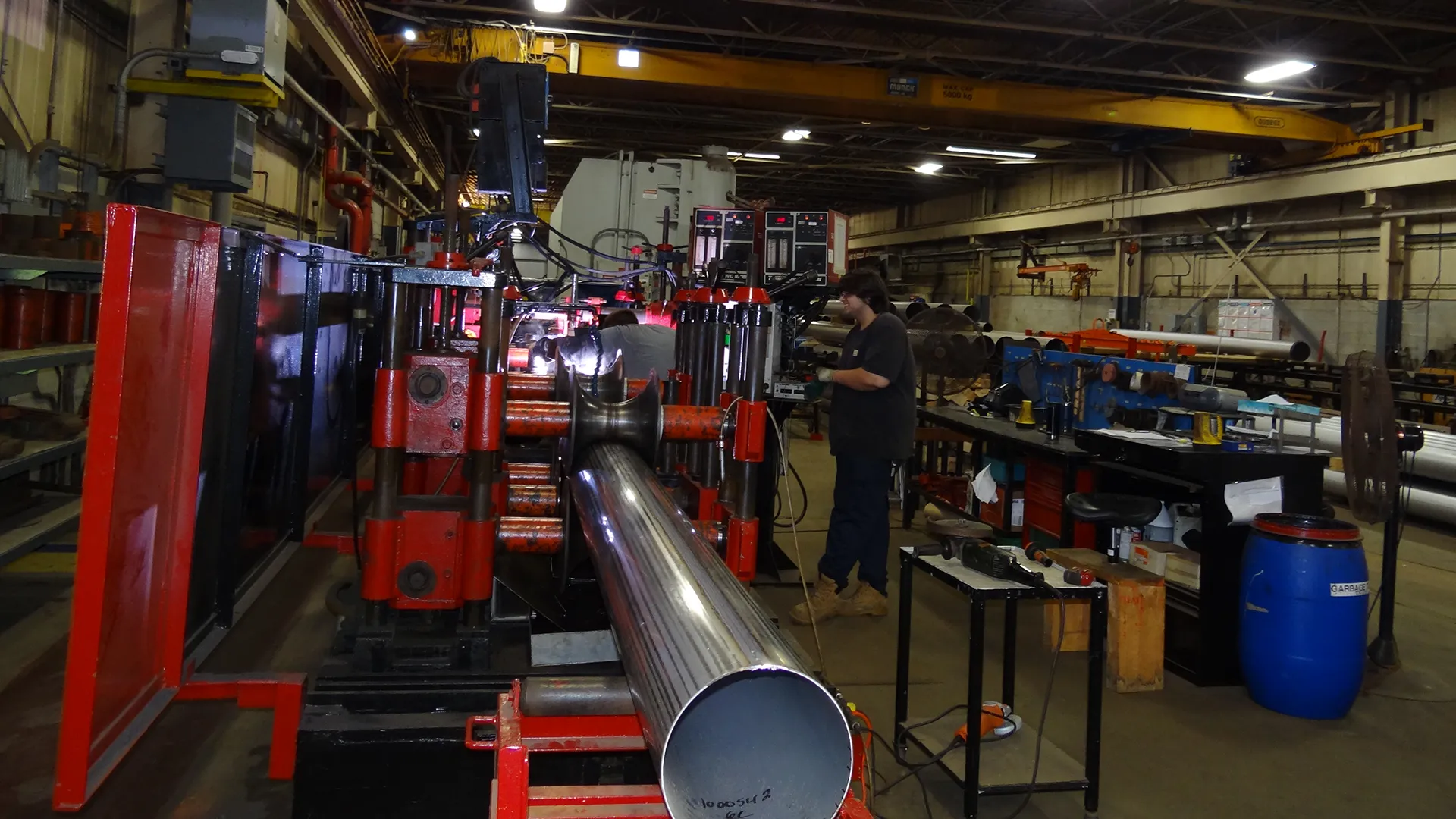 Employees working fabrication machinery