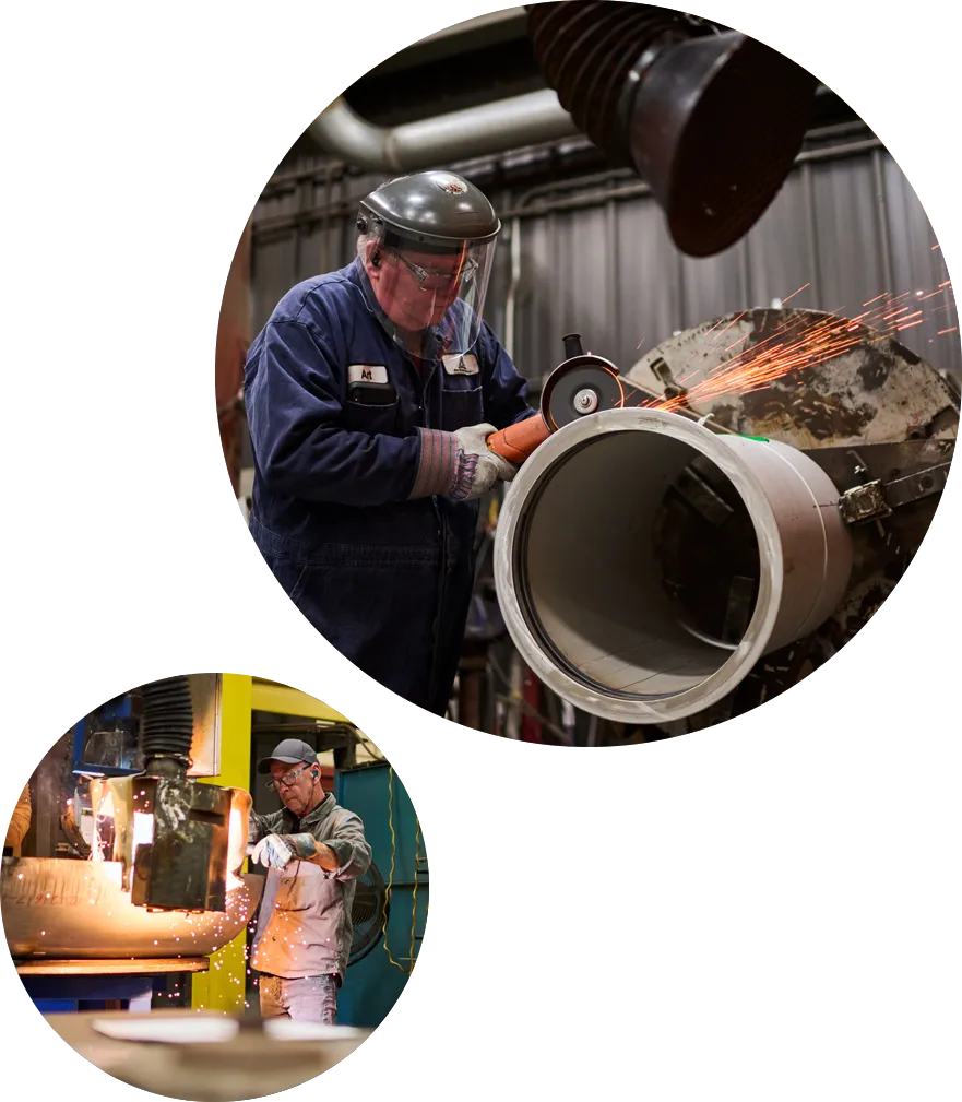 Workers welding and grinding pipe